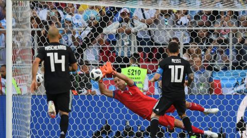 Hannes Halldórsson of Iceland saves a penalty from Lionel Messi of Argentina during a World Cup group match.