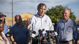Senator Jeff Merkley, a democrat from Oregon, second from right, speaks to members of the media outside of the Southwest Key-Casa Padre Facility, formerly a Walmart Inc. store, stands in Brownsville, Texas, U.S., on Sunday, June 17, 2018. Democrats escalated their attacks on President Donald Trump's policy of separating immigrant children from parents who illegally cross the Mexican border, as public outrage over the practice balloons into an election-year headache for Republicans. Photographer: Sergio Flores/Bloomberg via Getty Images