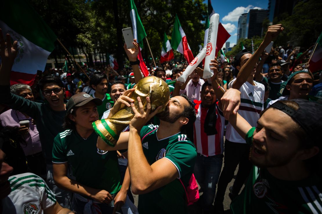 Mexico's victory is met with wild celebrations at  the Angel of Independence in the country's capital. 