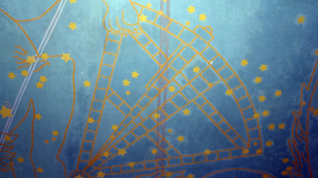 A constellation painted on the ceiling in "Constellations" before it was covered last November