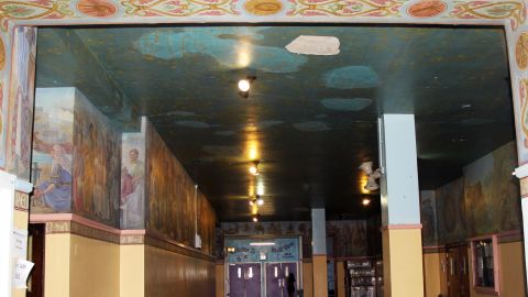 The ceiling of a hallway at Dewitt Clinton High School before "Constellations" was painted over
