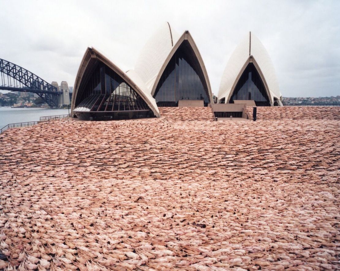 Tunick photographed nude participants in front of the Sydney Opera House in 2010.