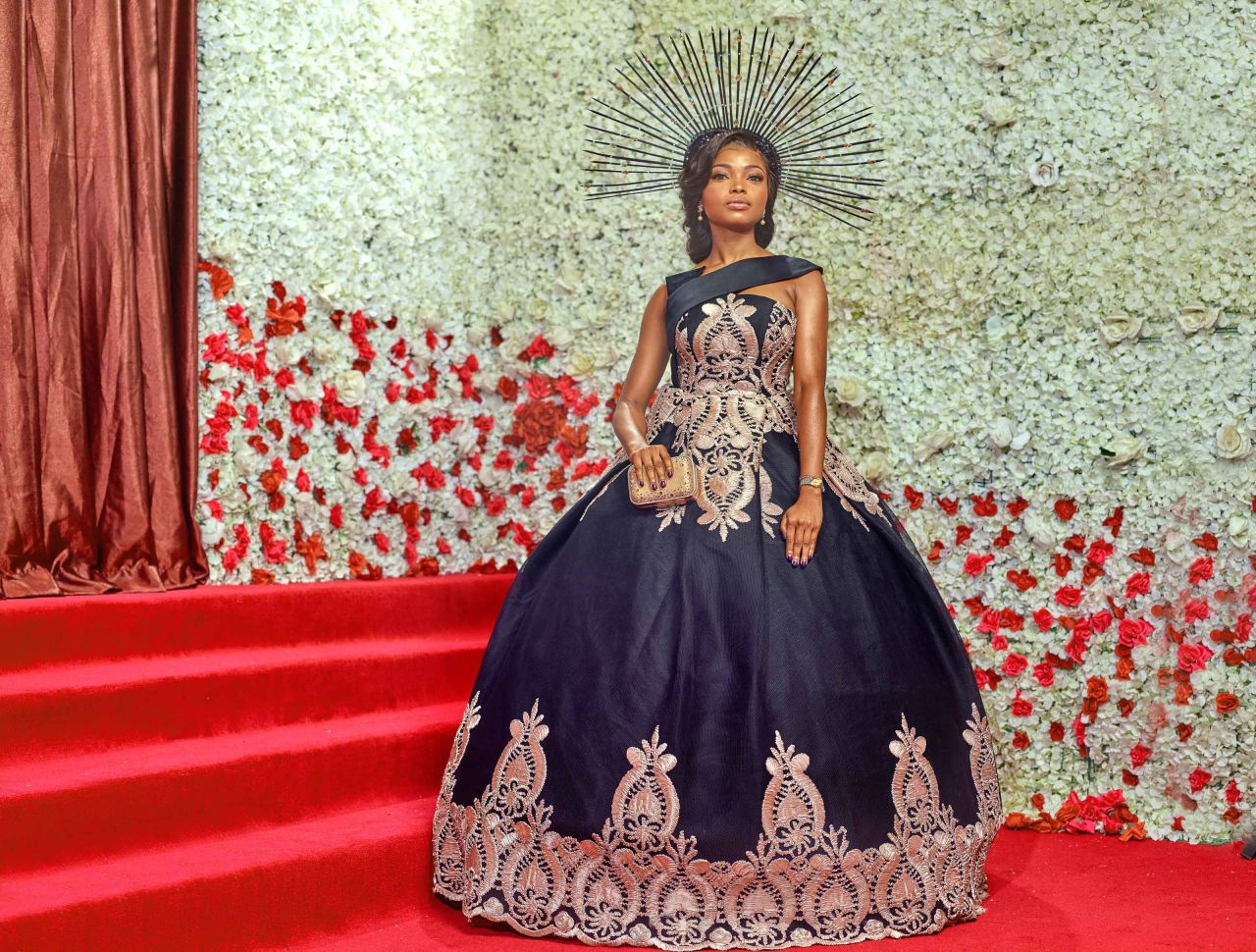 Fashion entrepreneur Bolaji Chizoba Ayinde wearing one of her own Nouva Couture creations with a head piece by Urez Kulture on the red carpet of the Ocean's 8 premiere in Lagos on Sunday June 17 2018. 