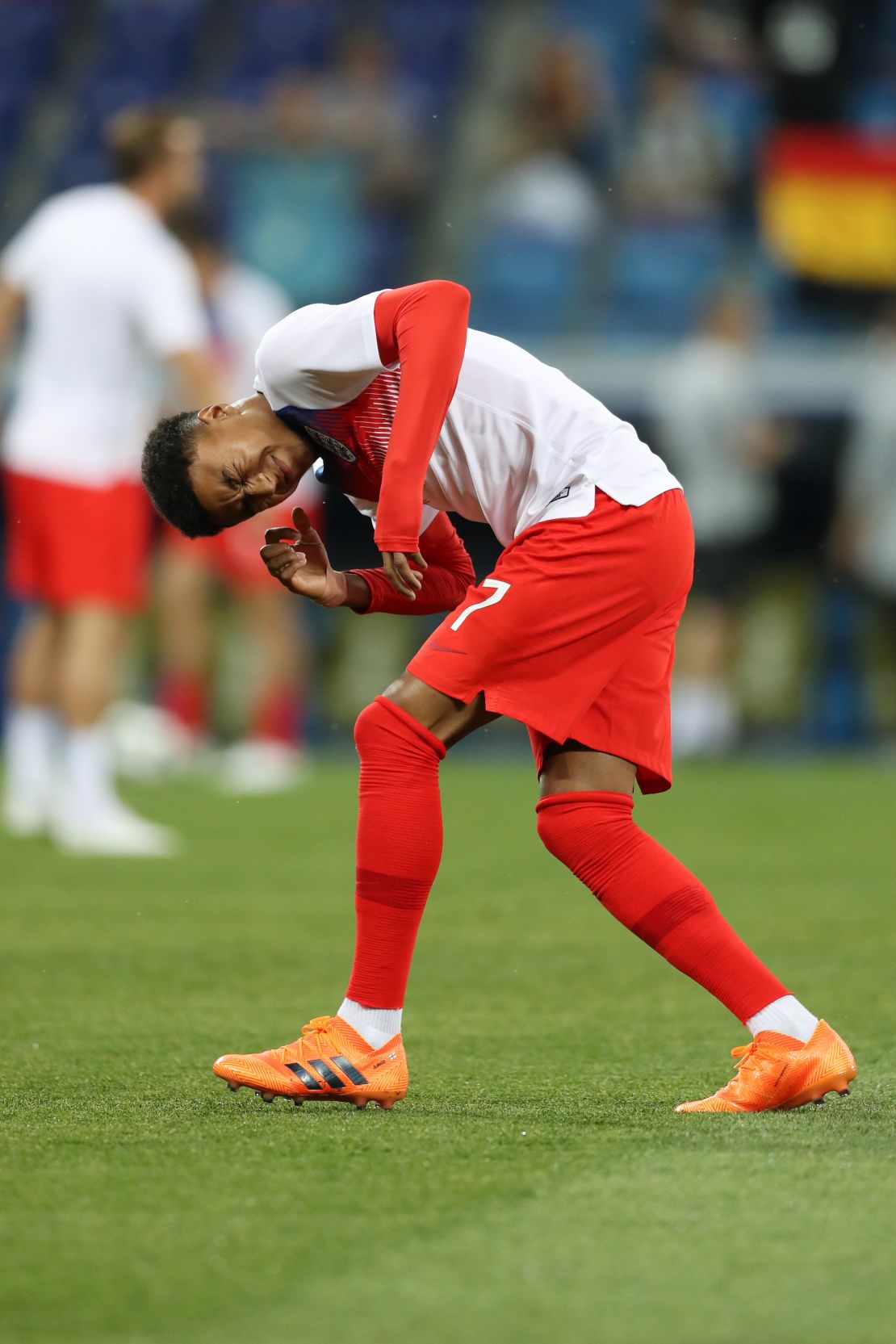 Jesse Lingard of England reacts after an insect lands on him ahead of the 2018 FIFA World Cup Russia group G match between Tunisia and England.