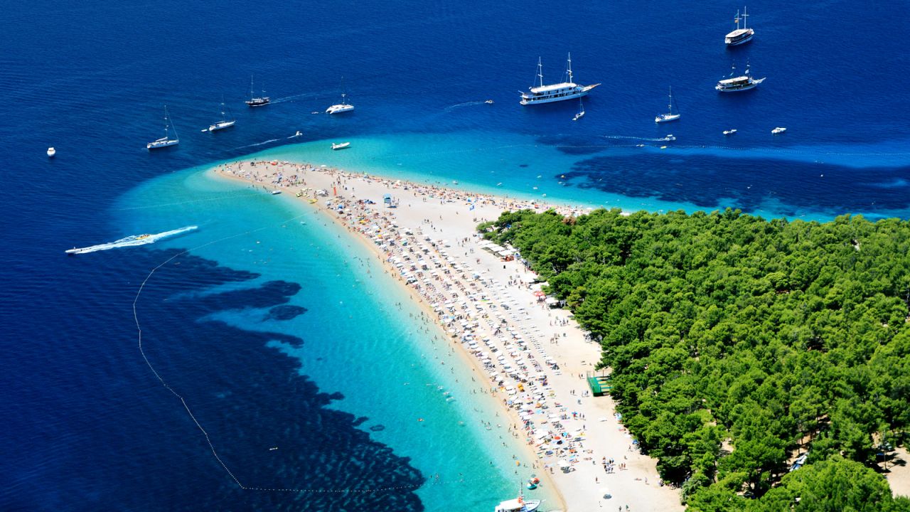 <strong>Zlatni Rat, Brač, Croatia:</strong> This spit of land extending out into the Adriatic Sea is fringed by a Mediterranean pine grove that's home to the remains of an ancient Roman villa. 