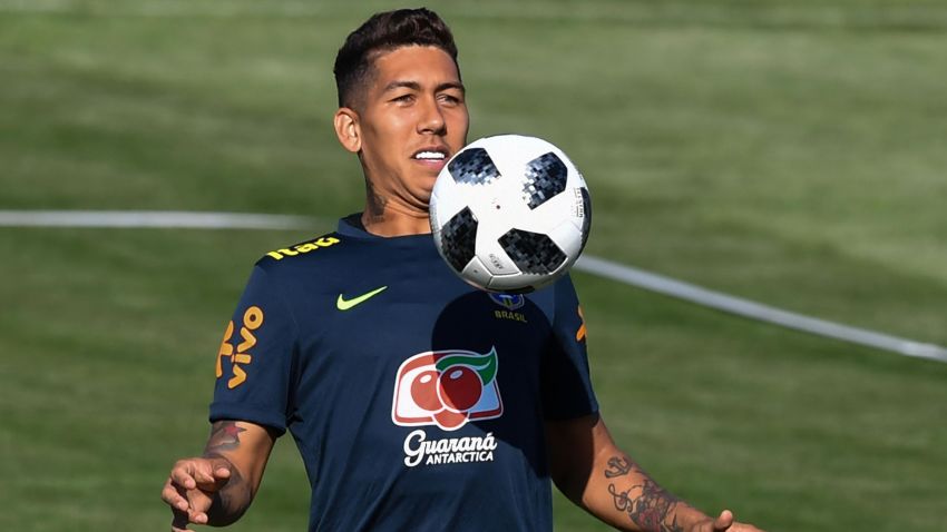 Brazil's forward Roberto Firmino controls the ball as he takes part in a training session of Brazil national football team at Yug Sport Stadium, in Sochi, on June 14, 2018, ahead of the Russia 2018 World Cup football tournament. (Photo by NELSON ALMEIDA / AFP)        (Photo credit should read NELSON ALMEIDA/AFP/Getty Images)