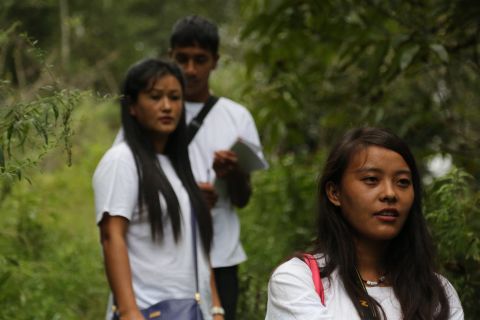Ganga Limbu (front) is a youth fellow for Vertical University. Since beginning work for the project three years ago, she has been trained in conservation, filming, computing and design.