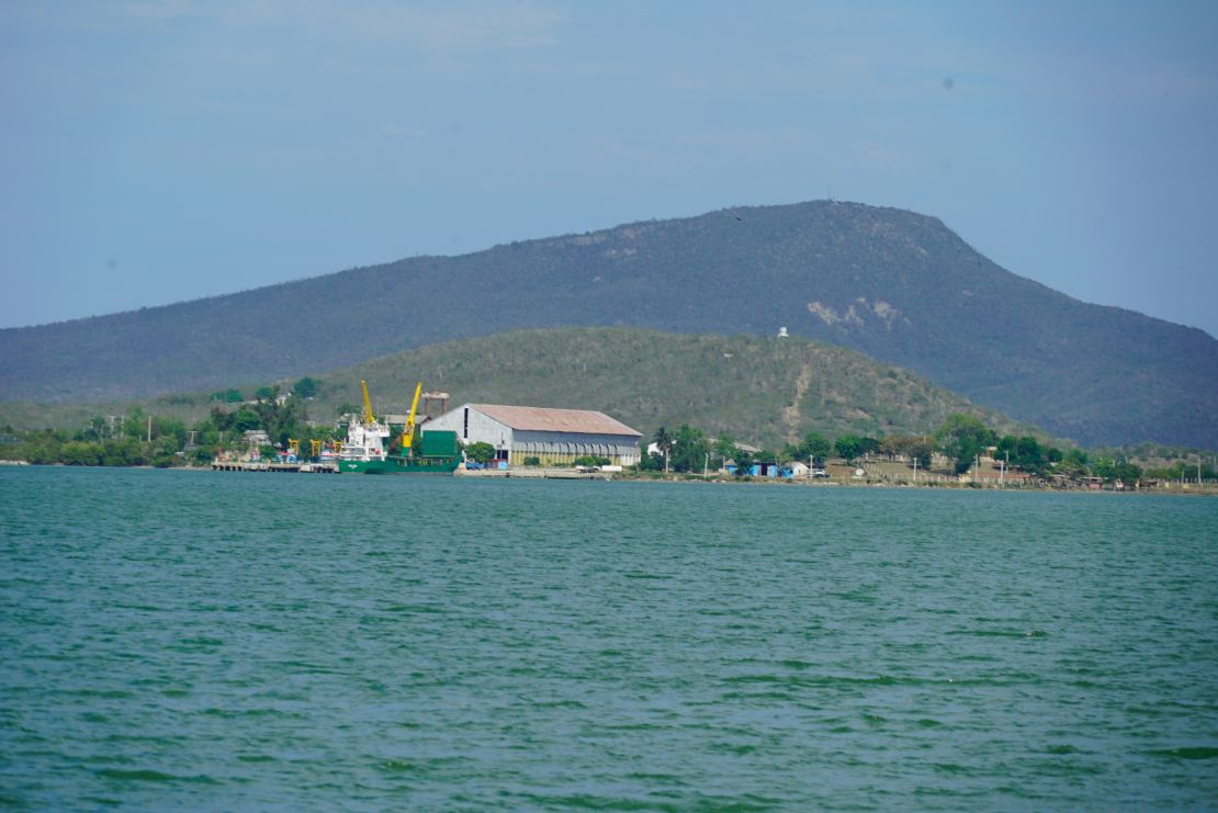 The US Guantanamo Bay Naval Base as seen in June 2018 from Cuban territory. In addition to the prison where enemy combatant detainees are held, the base boasts a bowling alley and a McDonald's for Marines and other base personnel.