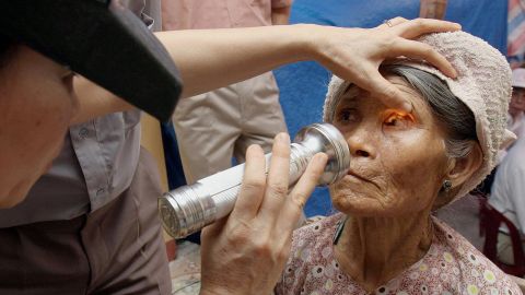 A farmer receives an examination for trachoma at a medical center in Vietnam, one of many countries aiming to eliminate the disease.