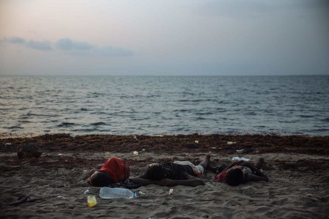 Ethiopian migrants sleep on the beach at Djibouti City. 