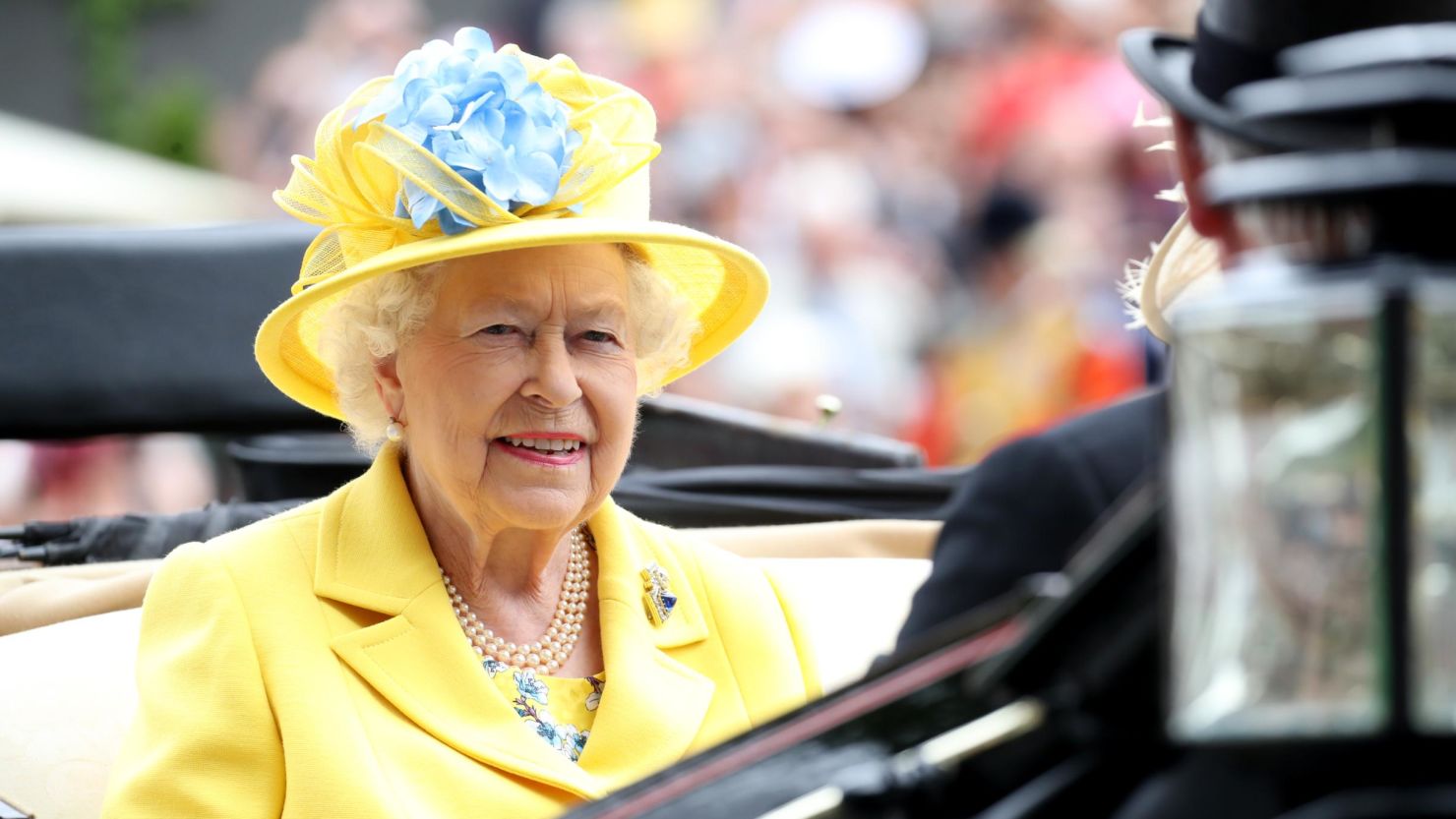 Queen Elizabeth II arrives by carriage to Royal Ascot Day 1 at Ascot Racecourse.