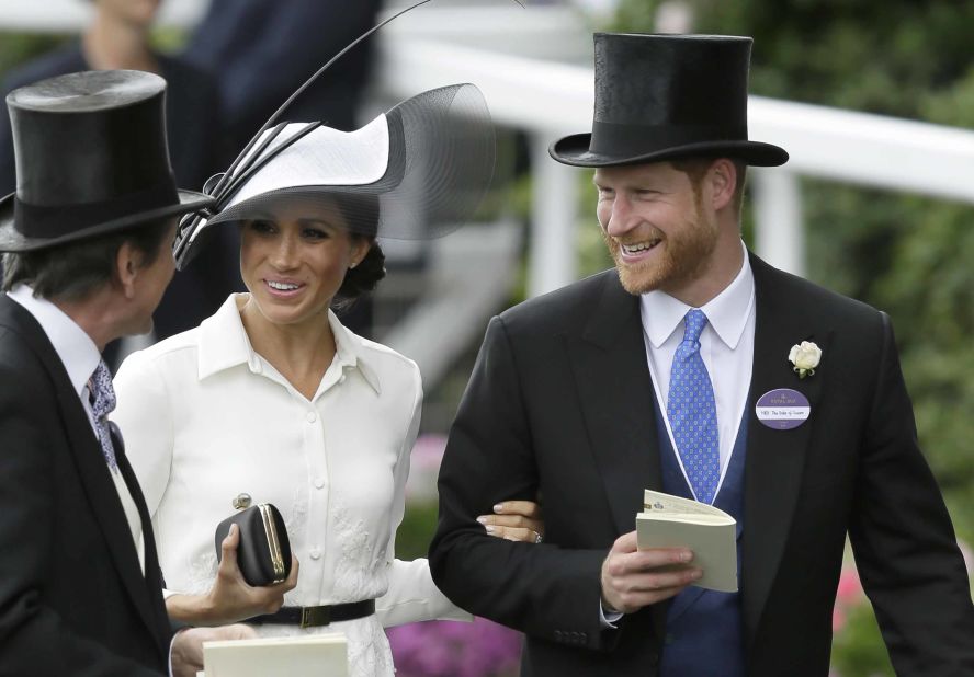 Harry and Meghan were all smiles as they arrived at the iconic Berkshire racecourse.