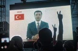 Selahattin Demirtas addresses supporters from jail during his presidential election campaign in June. 
