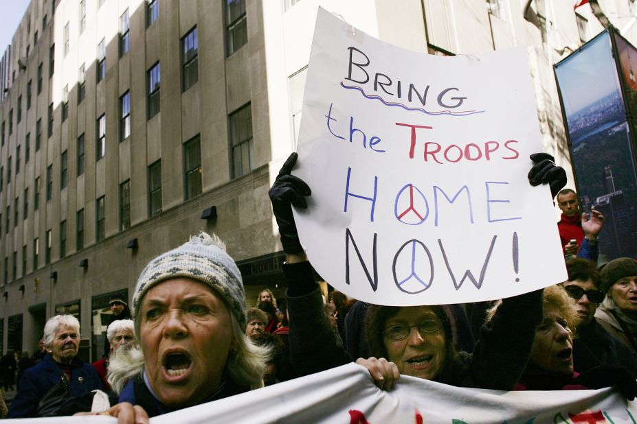 Antiwar protesters demonstrate during the New York City Veterans Day Parade in 2005.