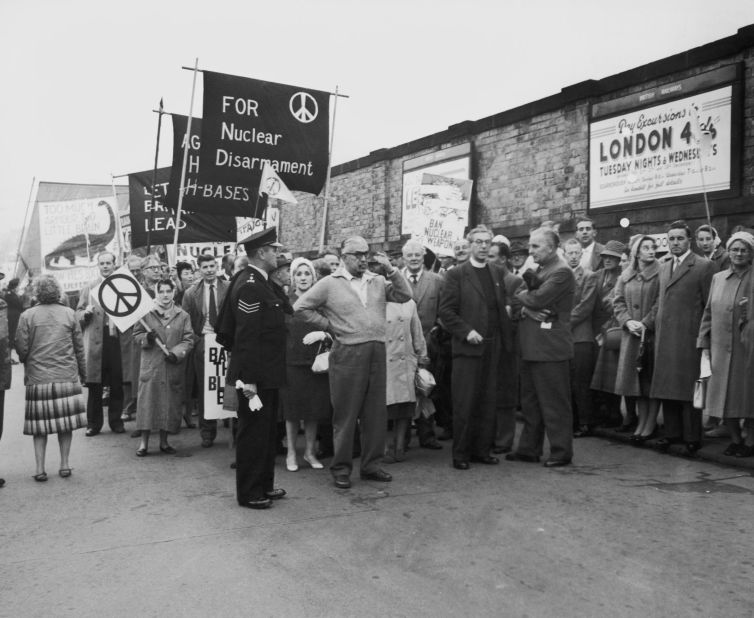 Anglican Canon John Collins, one of the founders of the CND anti-nuclear movement, heads a protest march through Scarborough in North Yorkshire in 1960. 