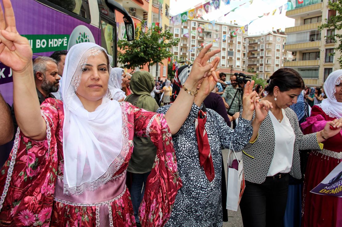 Candidates and supporters dance at the headquarters of the pro-Kurdish HDP party in Diyarbakir on May 24. 