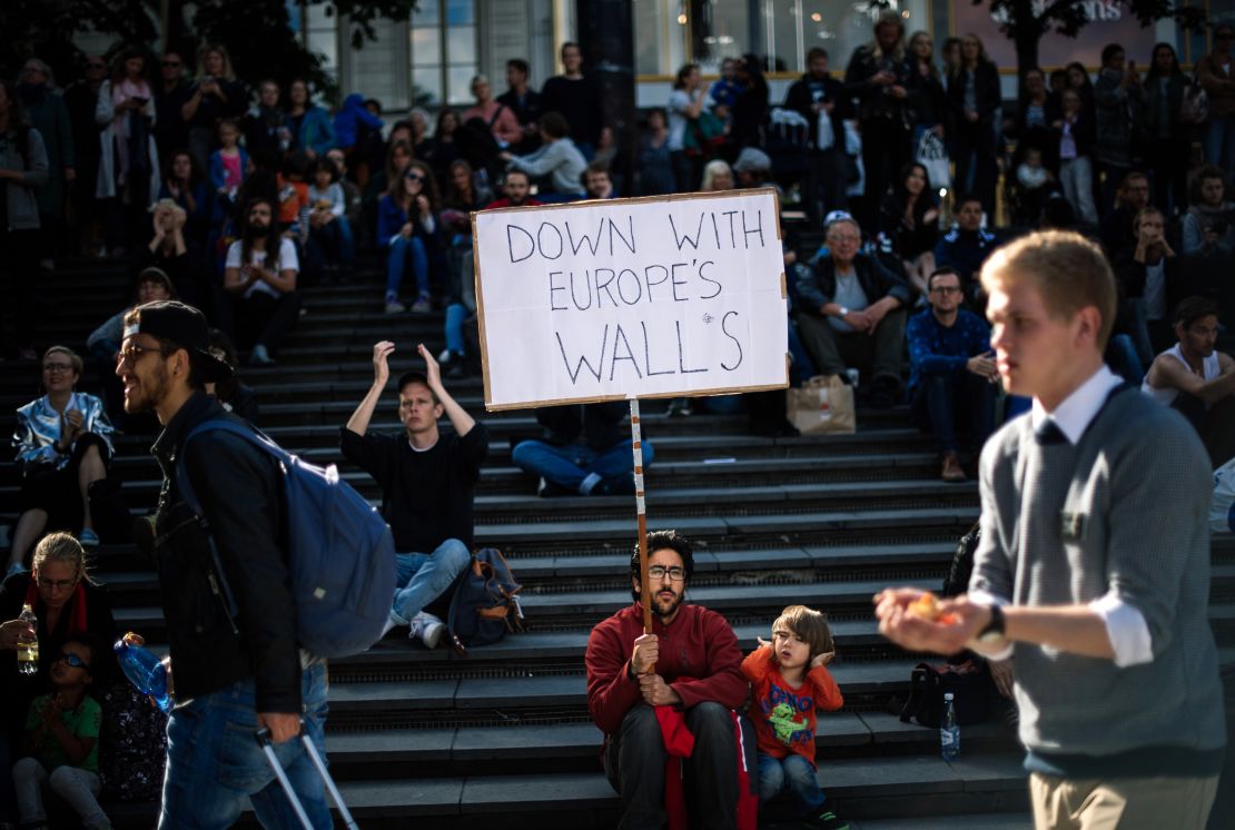 People in Stockholm show their solidarity with migrants in a rally in September 2015. Many people's attitudes in the country have since changed.