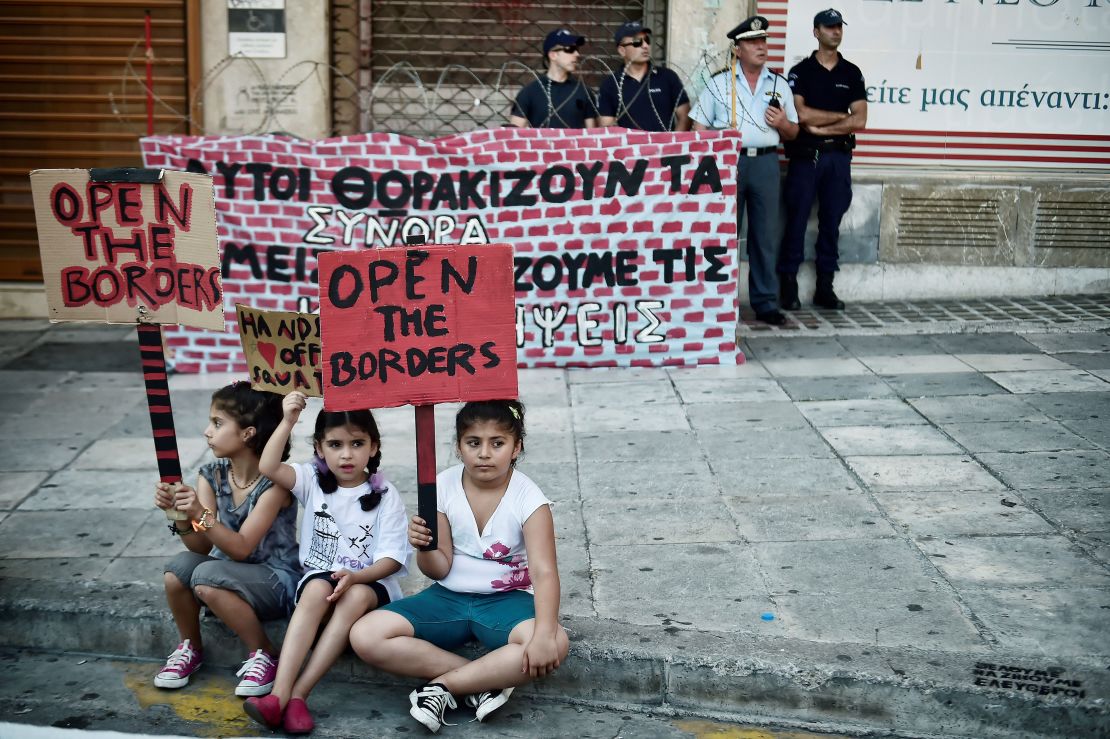 Refugee children in Athens call for safe routes out of Greece during a demonstration in June 2017. 