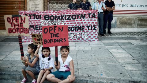 Refugee children in Athens call for safe routes out of Greece during a demonstration in June 2017. 