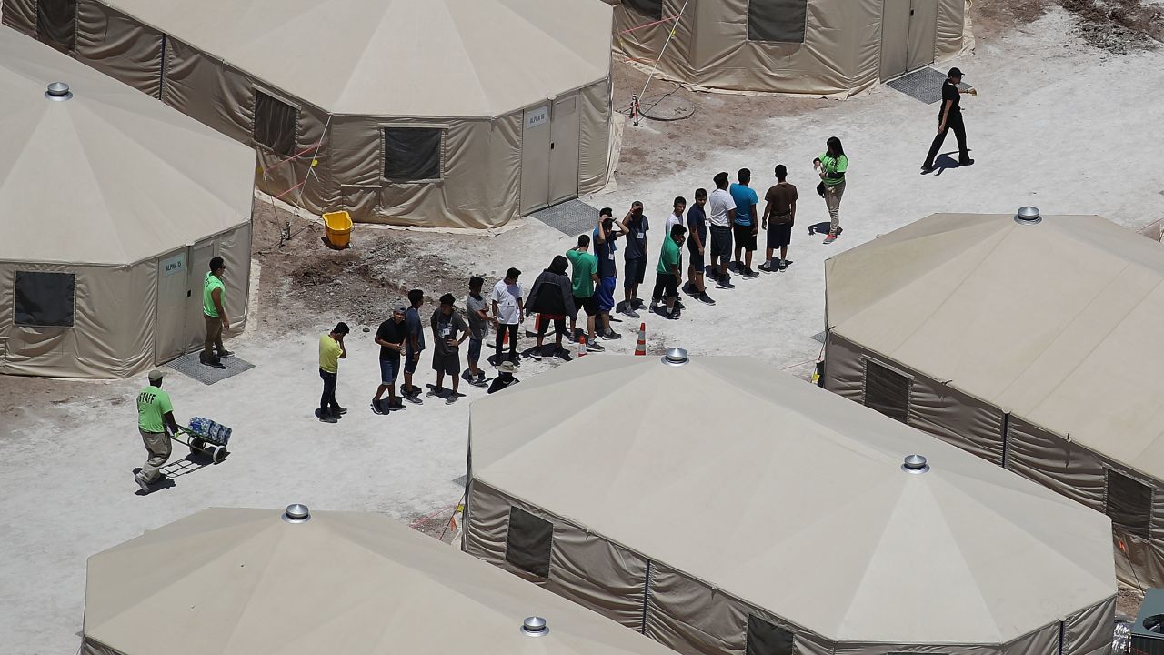 Another view from above of children and workers.