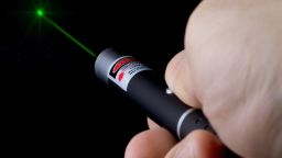 A stock image of a green laser pointer. 