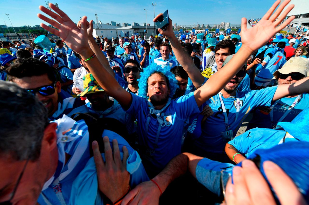 Uruguay fans cheer outside the stadium before the match with Saudi Arabia on June 20.