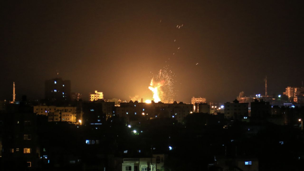 An explosion is seen in northern Gaza City after an airstrike by Israeli forces on June 20, 2018.