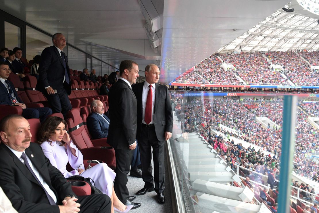 Putin and Prime Minister Dmitry Medvedev attend the opening ceremony of the World Cup.