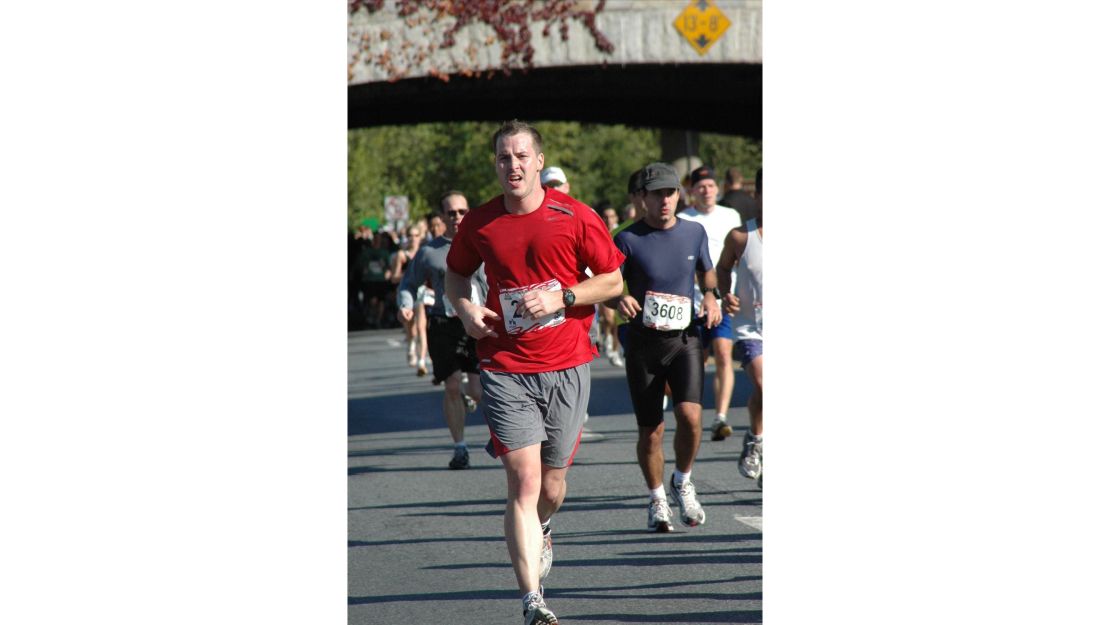 Justin Blazejewski running a marathon before an ankle injury left him unable to run long distances. 