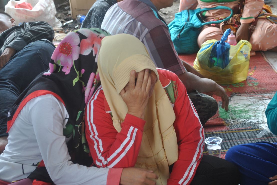 Suparmi waits for news of her missing son.