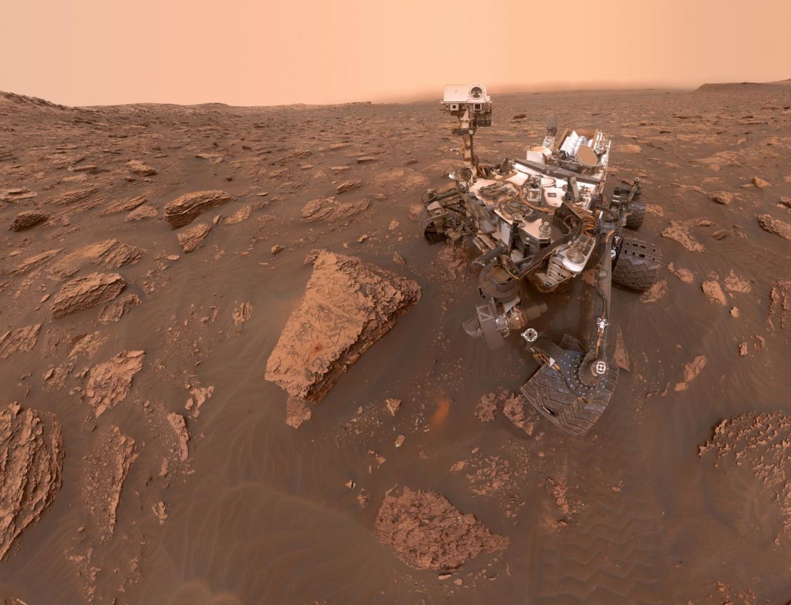 A self-portrait taken by NASA's Curiosity rover taken on Sol 2082 (June 15, 2018). A Martian dust storm has reduced sunlight and visibility at the rover's location in Gale Crater. Image Credit: NASA/JPL-Caltech 
