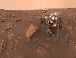 A self-portrait taken by NASA's Curiosity rover taken on Sol 2082 (June 15, 2018). A Martian dust storm has reduced sunlight and visibility at the rover's location in Gale Crater. Image Credit: NASA/JPL-Caltech 