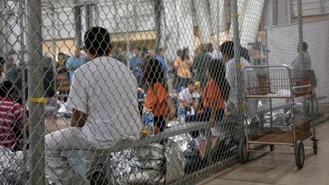 MCALLEN, TX - JUNE 17: In this handout photo provided by U.S. Customs and Border Protection, U.S. Border Patrol agents conduct intake of illegal border crossers at the Central Processing Center on June 17, 2018 in McAllen, Texas. (Photo by U.S. Customs and Border Protection via Getty Images)
