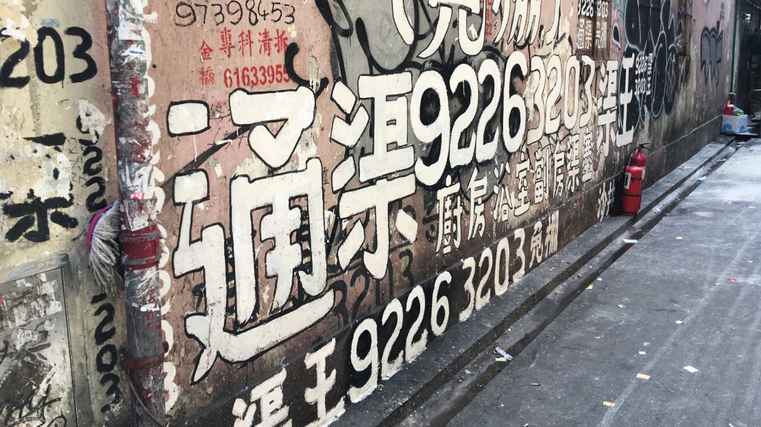 The Plumber King's graffiti ads are now legendary in Hong Kong.