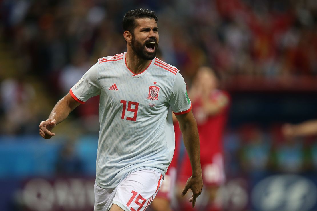 Costa wheels away in celebration after giving Spain the lead.