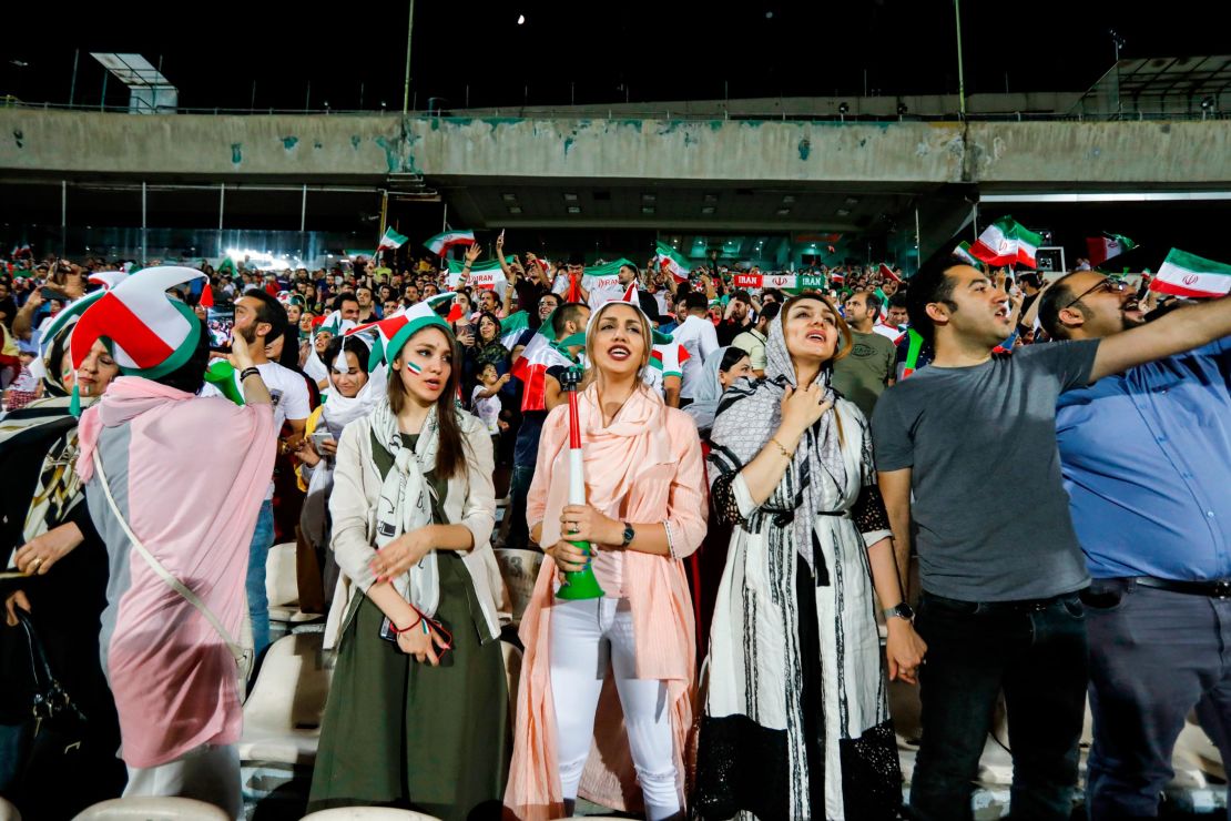 Iranian women cheer for their national team during the screening at Azadi stadium in the capital, Tehran.