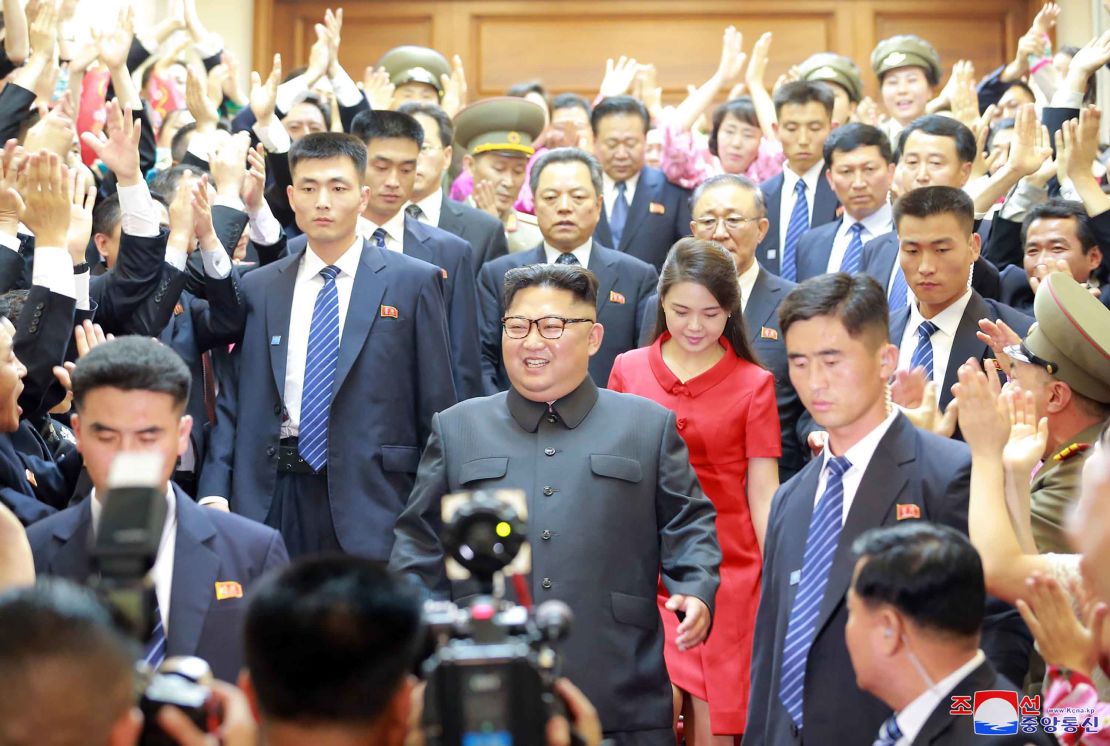 North Korean leader Kim Jong Un and his wife Ri Sol Ju arrive at North Korean Embassy in Beijing, June 20.