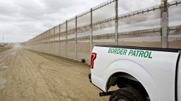 A U.S. Border Patrol vehicle sits parked next to a secondary fence along the U.S.-Mexico border in San Diego, California, U.S., on Monday, Oct. 30, 2017. President Donald Trump told a group of Republican lawmakers who met with him at the White House that he opposes any effort to include in the legislation deportation protections for 800,000 people, known as Dreamers, who entered the U.S. illegally as children, according to several who attended the meeting. Photographer: Daniel Acker/Bloomberg via Getty Images