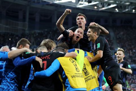 Croatian players celebrate the second goal in their 3-0 victory over Argentina on June 21. The victory clinched them a spot in the knockout stage.