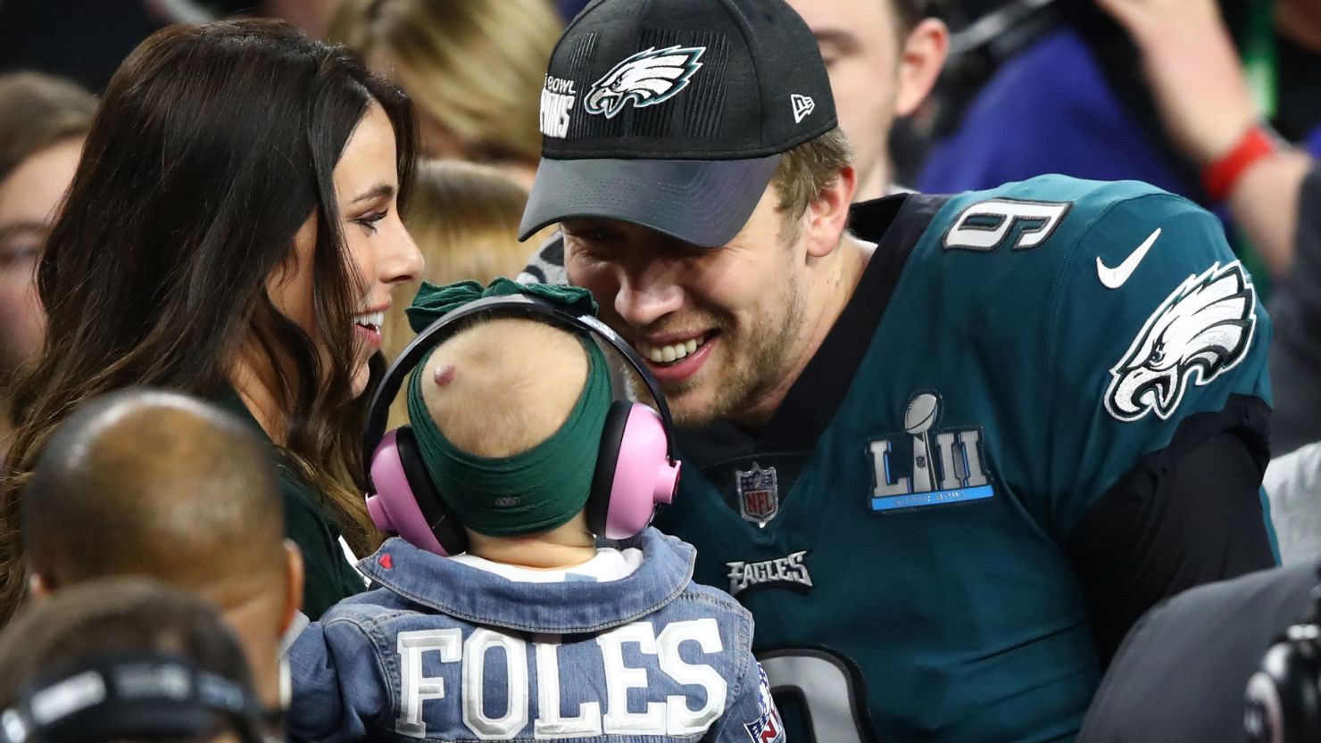 Nick Foles, his wife, Tori, and their daughter celebrate after the Eagles beat the Patriots during last year's Super Bowl. 