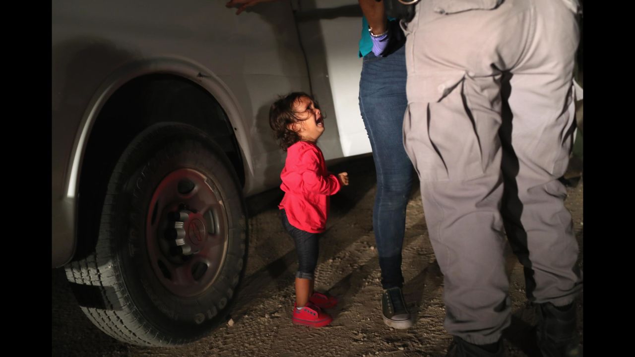 A 2-year-old Honduran girl cries as her mother is searched and detained in McAllen, Texas, near the US-Mexico border. They had rafted across the Rio Grande and were stopped by US Border Patrol agents, according to Getty Images photographer John Moore. <a href="https://www.cnn.com/interactive/2018/06/us/crying-girl-john-moore-immigration-cnnphotos/" target="_blank">The photo went viral this past week</a> as an example of the Trump administration's new "zero-tolerance" immigration policy. The administration has said it will refer everyone caught crossing the border illegally for prosecution, even if they are claiming to deserve asylum or have small children.