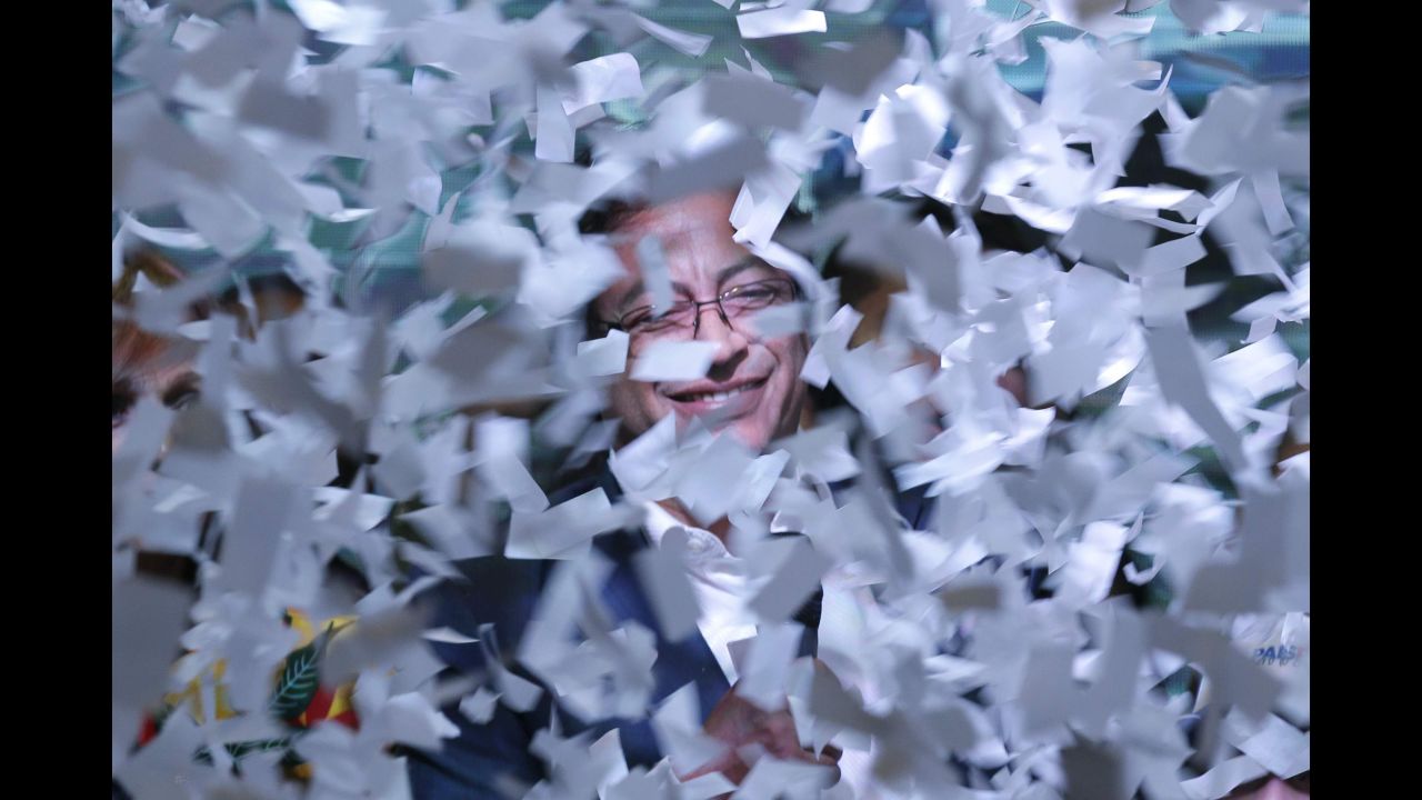 Colombian presidential candidate Gustavo Petro is surrounded by ticker tape while speaking to supporters in Bogota, Colombia, on Sunday, June 17. Petro, the mayor of Bogota, <a href="https://www.cnn.com/2018/06/17/americas/colombia-runoff-election/index.html" target="_blank">lost to Ivan Duque.</a>