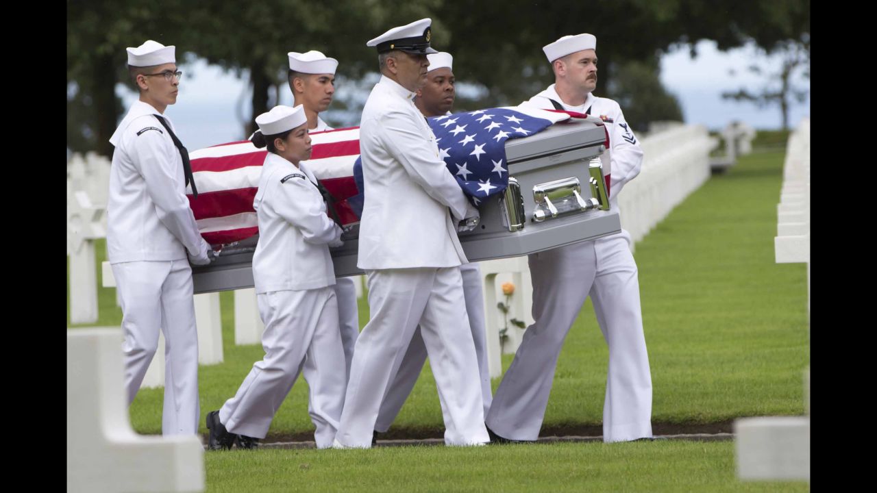 US Navy personnel carry the casket of Julius Pieper, a sailor who died in World War II, during a reburial service in Colleville-sur-Mer, France, on Tuesday, June 19. Pieper was being reunited with his twin brother, Ludwig, <a href="https://www.cnn.com/2018/06/21/us/world-war-ii-twins-reunited-74-years-later-trnd/index.html" target="_blank">74 years after their ship hit a mine</a> off the coast of Normandy.