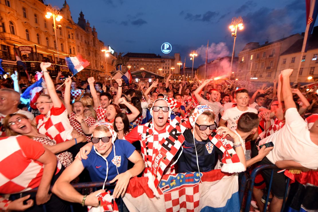 Croatia's fans watch their team's victory on a giant screen in Zagreb.