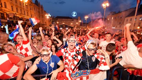 Croatia's fans watch their team's victory on a giant screen in Zagreb.