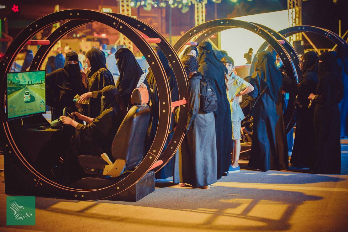 Women take part in a government-organized road safety event at Riyadh Park Mall, in the Saudi capital, on Thursday.