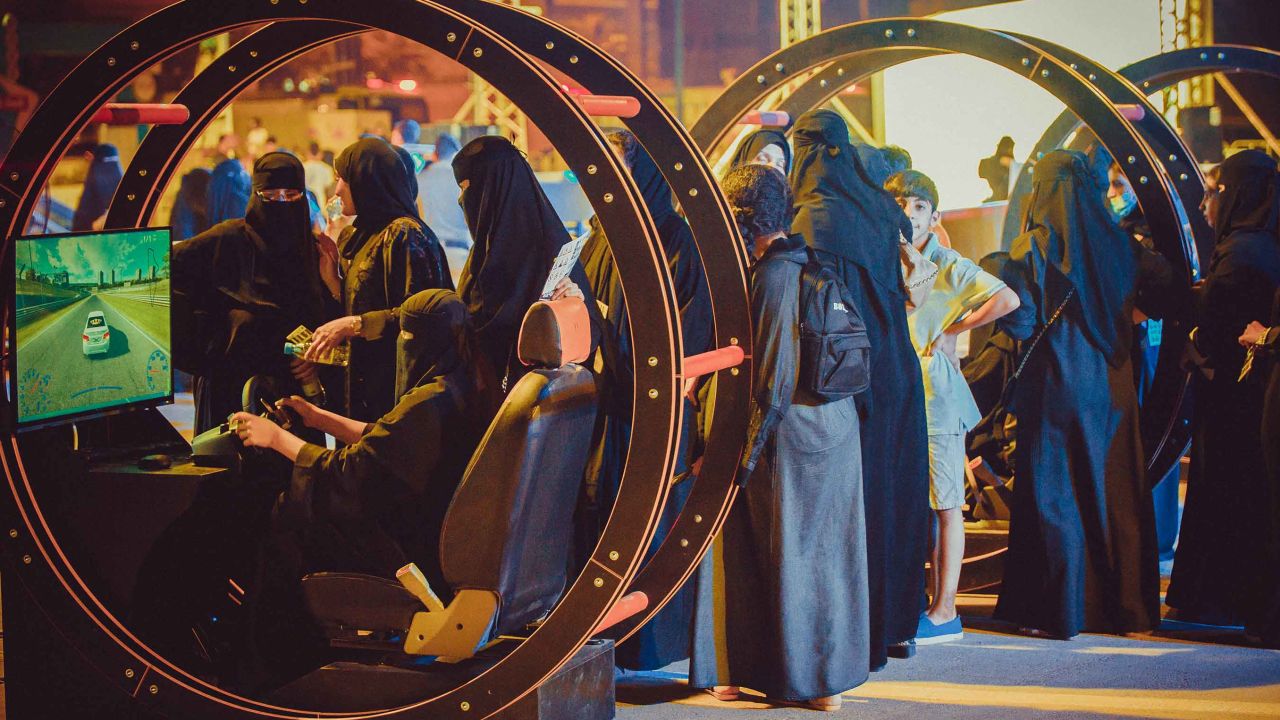 Women take part in a government-organized road safety event at Riyadh Park Mall, in the Saudi capital, on Thursday.