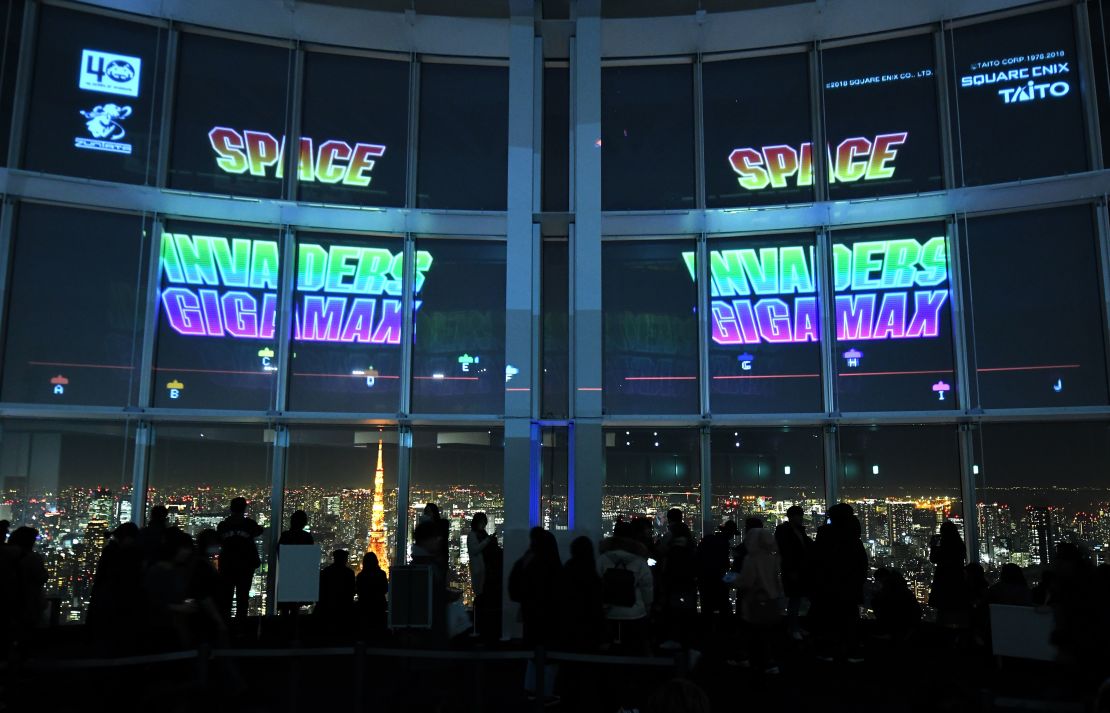 Space Invaders is played on the windows of the Roppongi Hills observatory in Tokyo during a 2018 exhibition celebrating the 40th anniversary of the game.