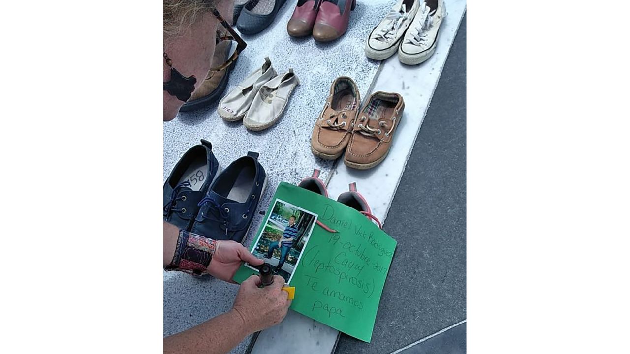 Daniel L. Vick's family left a pair of his shoes at a memorial for uncounted victims of Hurricane Maria in San Juan.