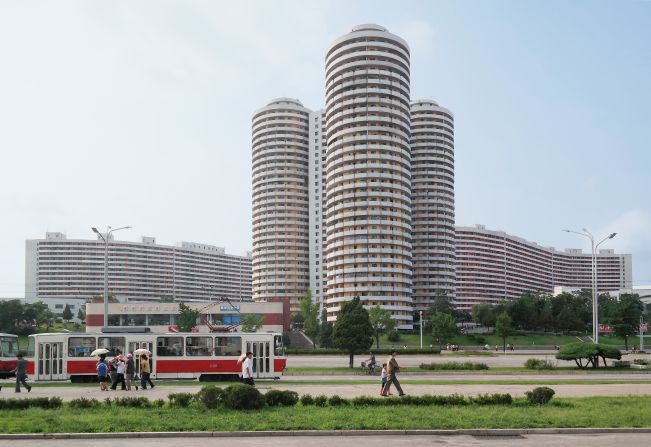 Wainwright's depictions of Pyongyang's utilitarian apartment blocks and public sports facilities serve as a reminder that, as in any city, form sometimes follows function.